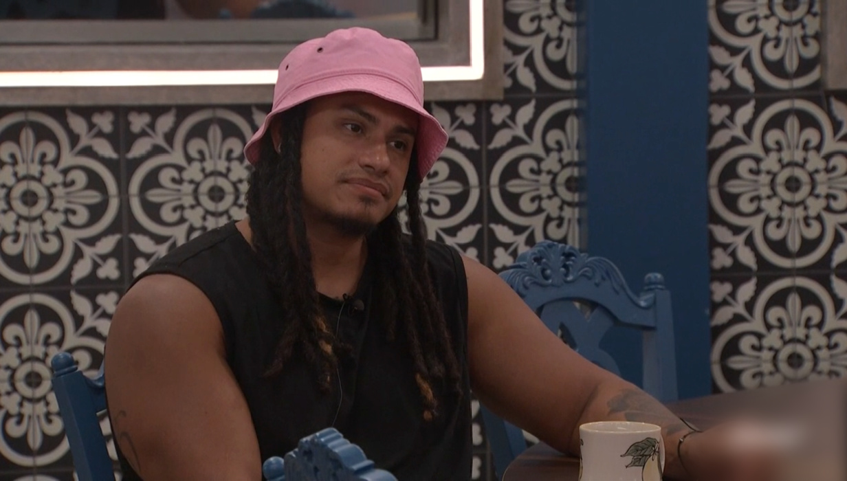 A beach at sunset with vibrant colors and calm waves.