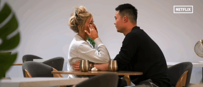 Couple shares an intimate moment, gazing into each other's eyes. Couple shares an intimate moment, gazing into each other's eyes.